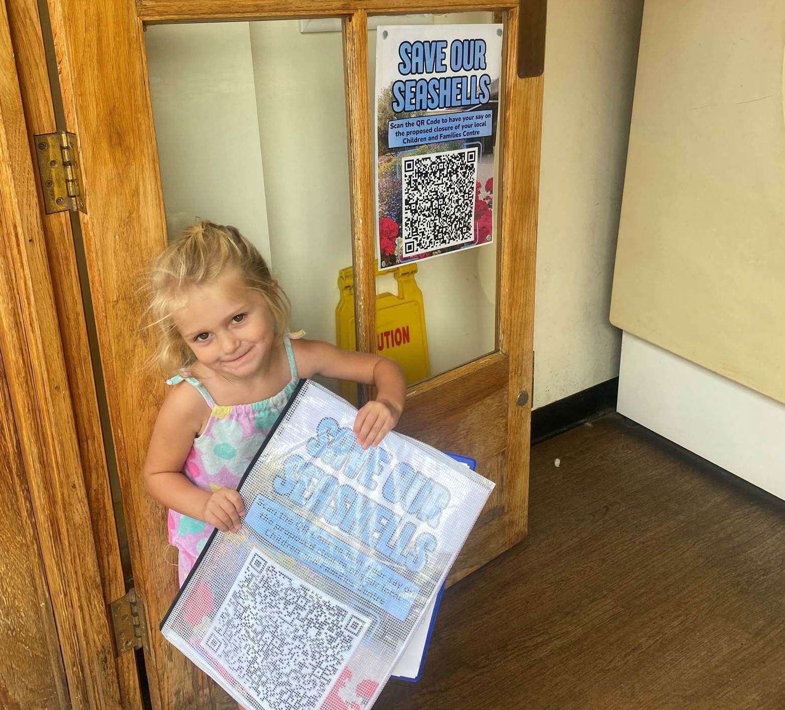 Three-year-old Freya has been handing out posters to businesses in Sheerness. Picture: Kim Green