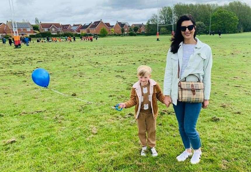 Adele Quittenden's picture of her family with tribute in Aylesham which featured a blue balloon