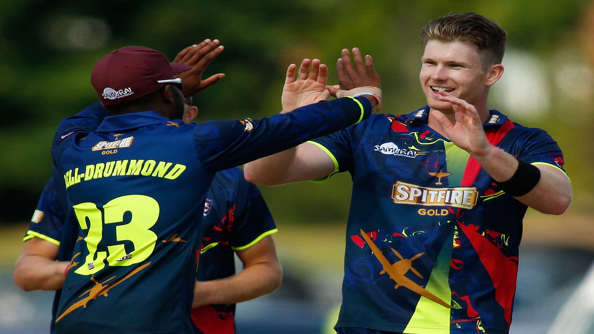 New signing Jimmy Neesham celebrates a wicket with Daniel Bell-Drummond. Picture: Andy Jones