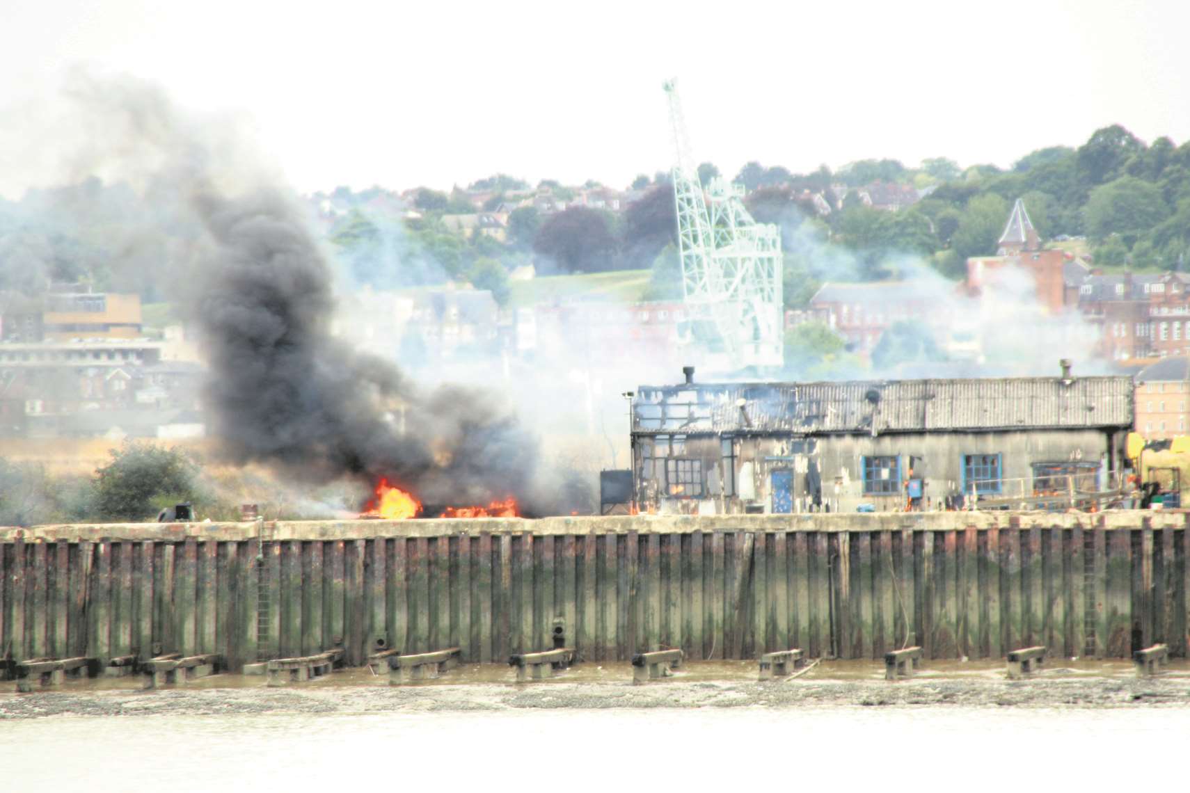 An explosion was felt for miles after a single storey building caught fire, causing a cylinder to detonate