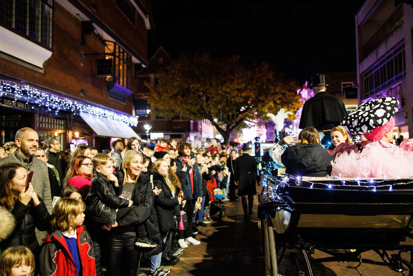 Families watch a horse-drawn carriage go by. Picture: Canterbury BID/Matt Wilson