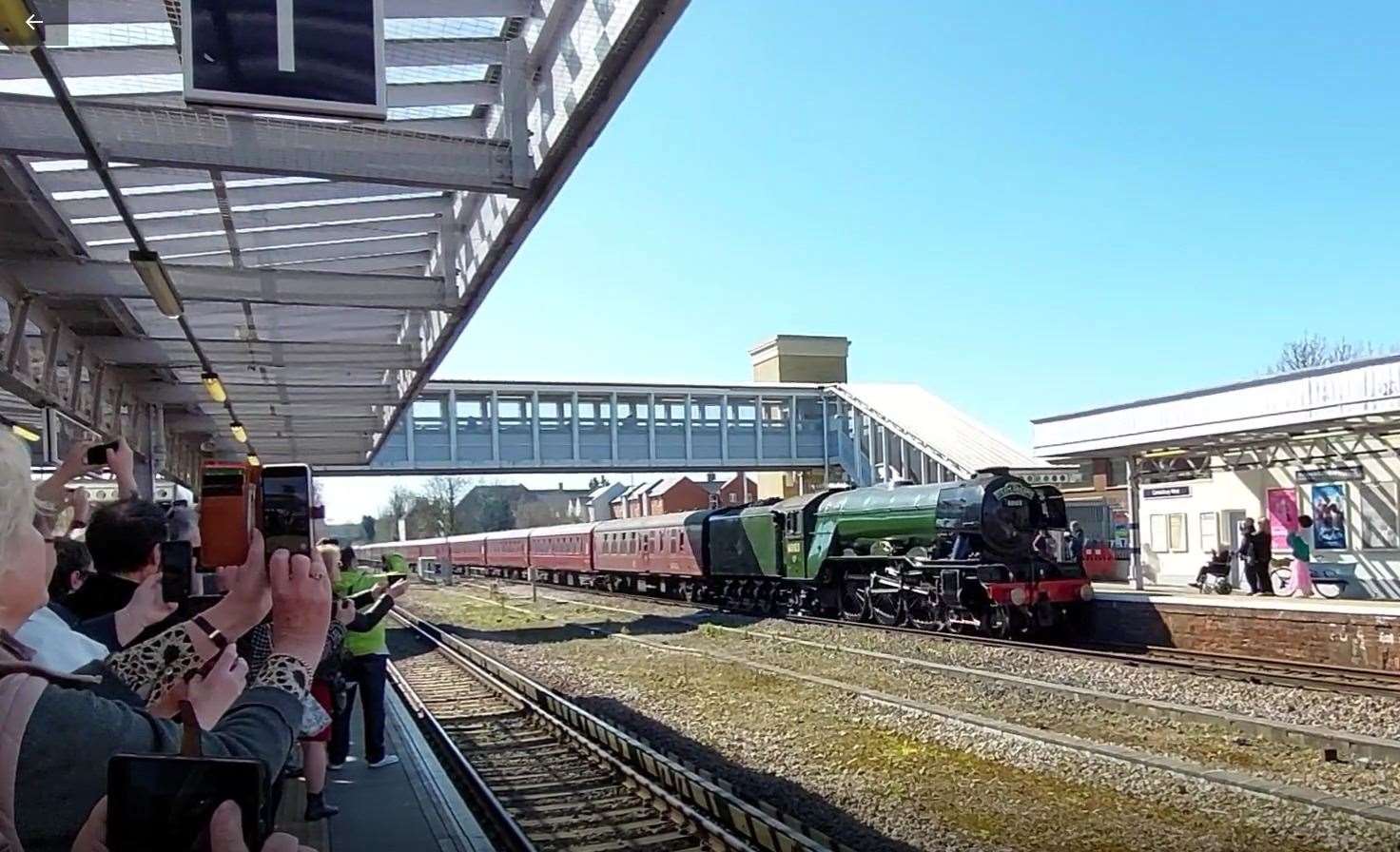 The Flying Scotsman arrives at Canterbury West - its first time in Kent for 50 years - as hundreds watch on