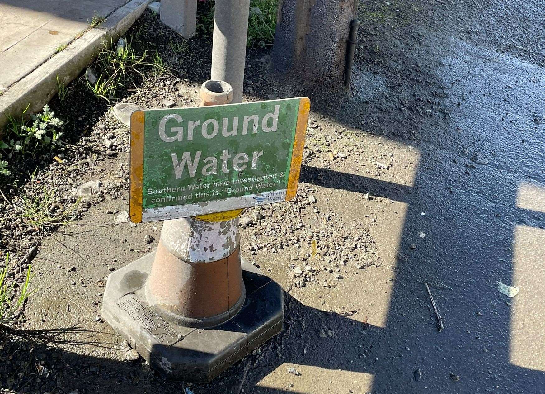 Southern Water has placed a sign by the water leak outside A2 Tyre Supplies