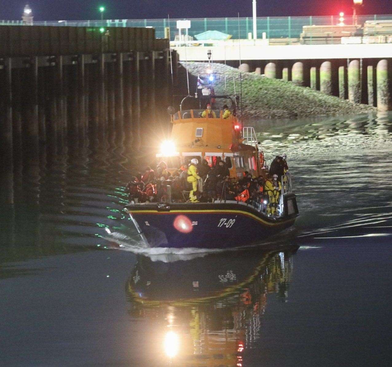 Migrants brought ashore by an RNLI rescue crew. Picture: UKNIP