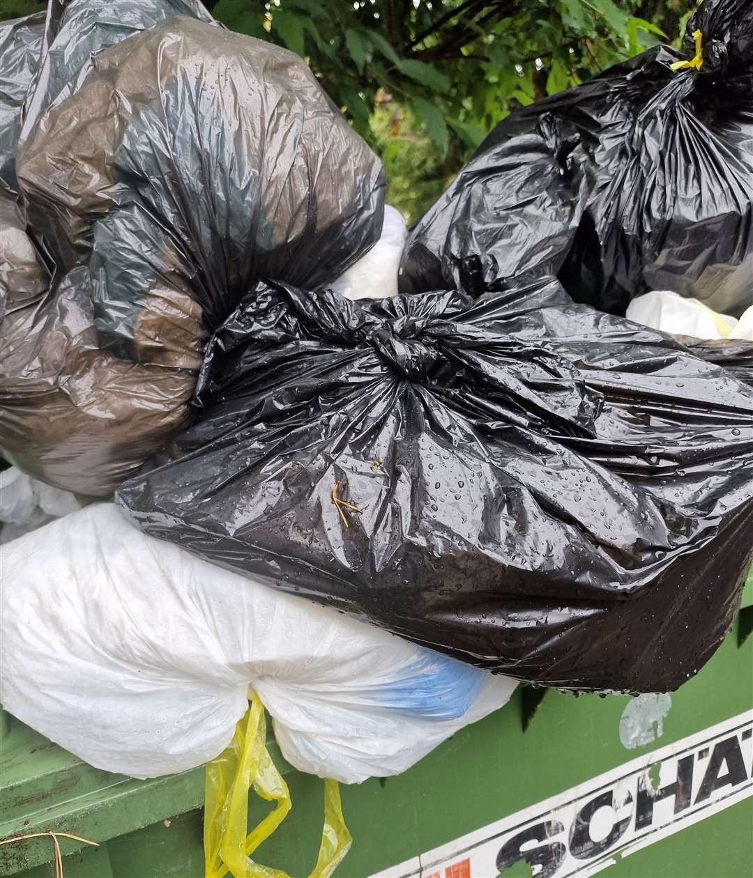 The bins are overflowing with rubbish