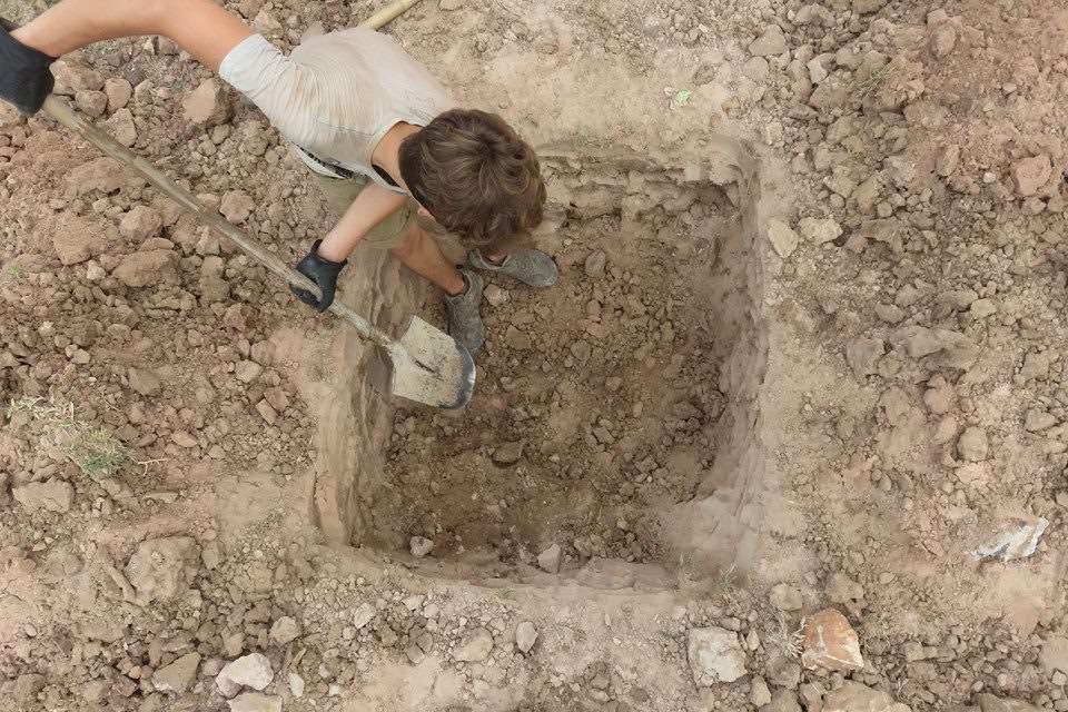 Matt while working on the foundations of a school in Cambodia during his travelling earlier this year