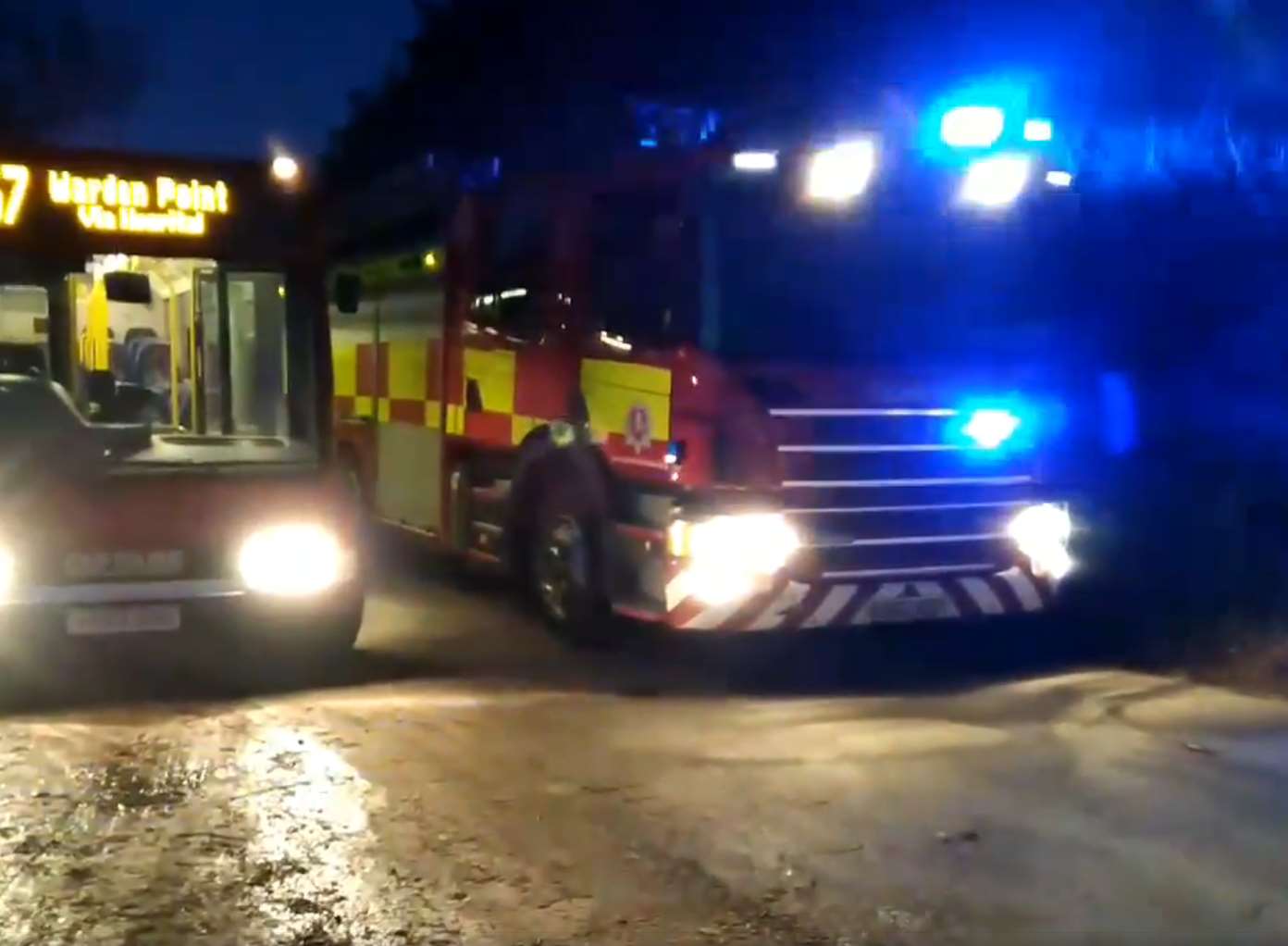 Firefighters were delayed this morning after a wall fell into the road