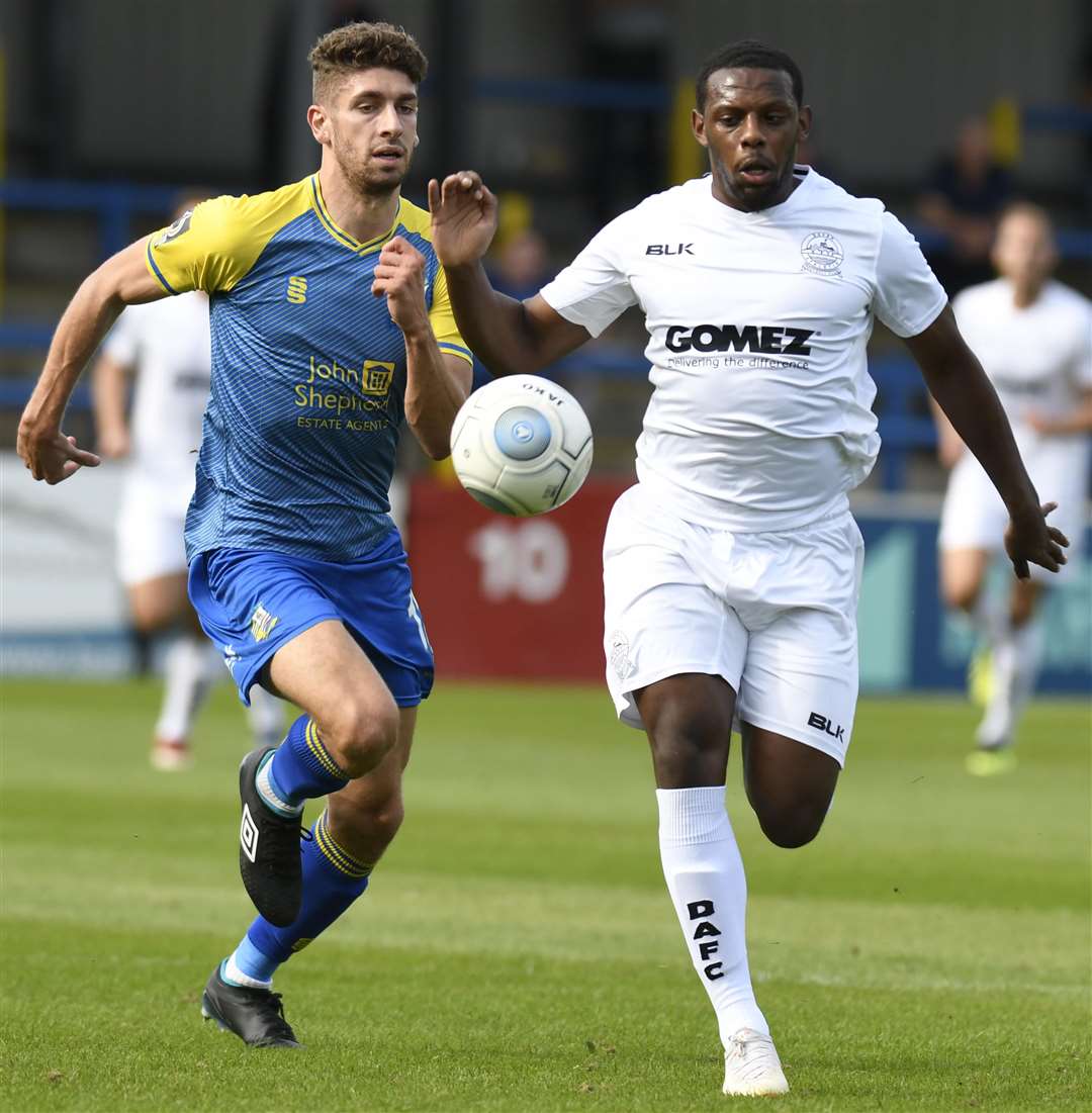 Dover's Anthony Jeffrey in a foot race against Solihull's George Carline Picture: Tony Flashman.