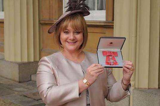 Sandra Matthews-Marsh collects her MBE