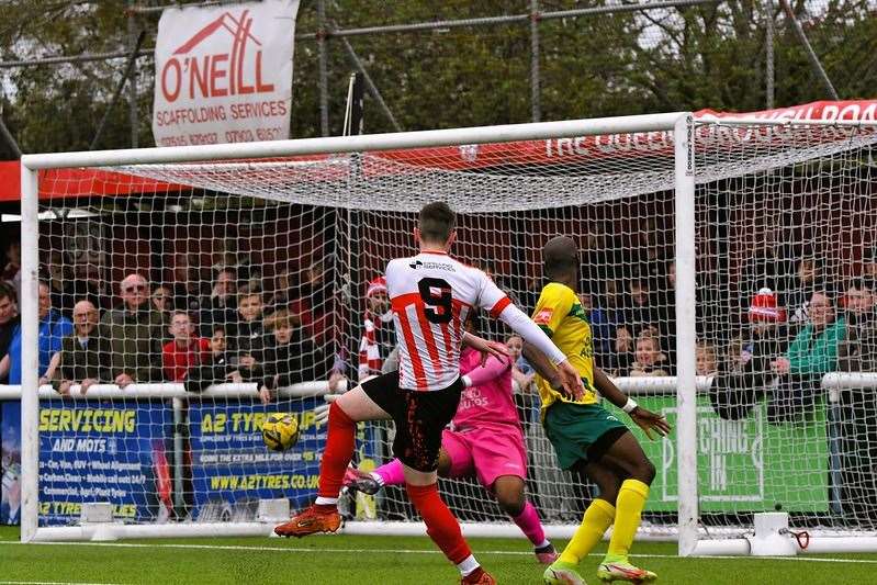 Dan Bradshaw scores for Sheppey United against Ashford United Picture: Marc Richards