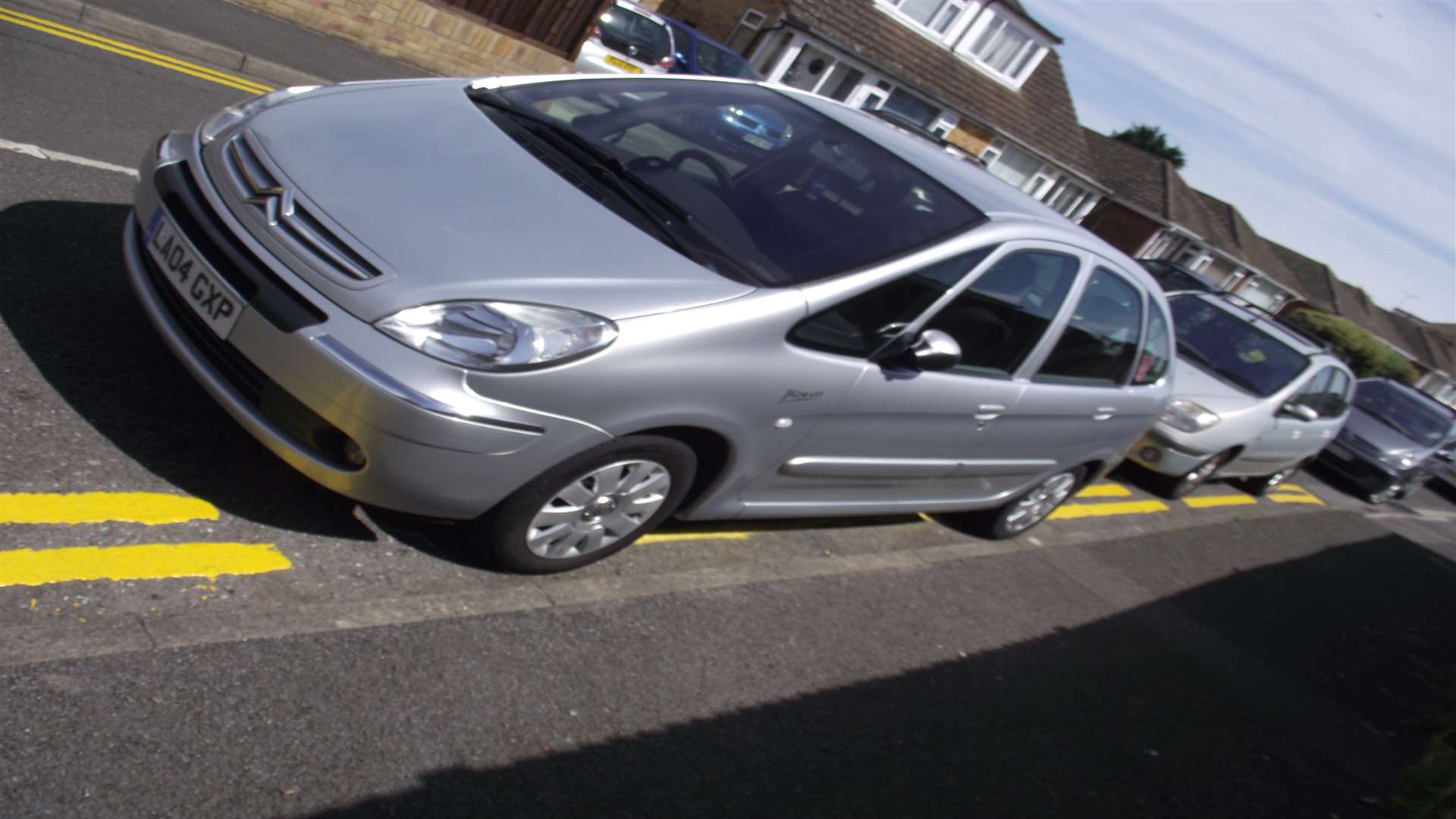 The yellow lines - put down after the people carriers were parked in Seabourne Way in Dymchurch