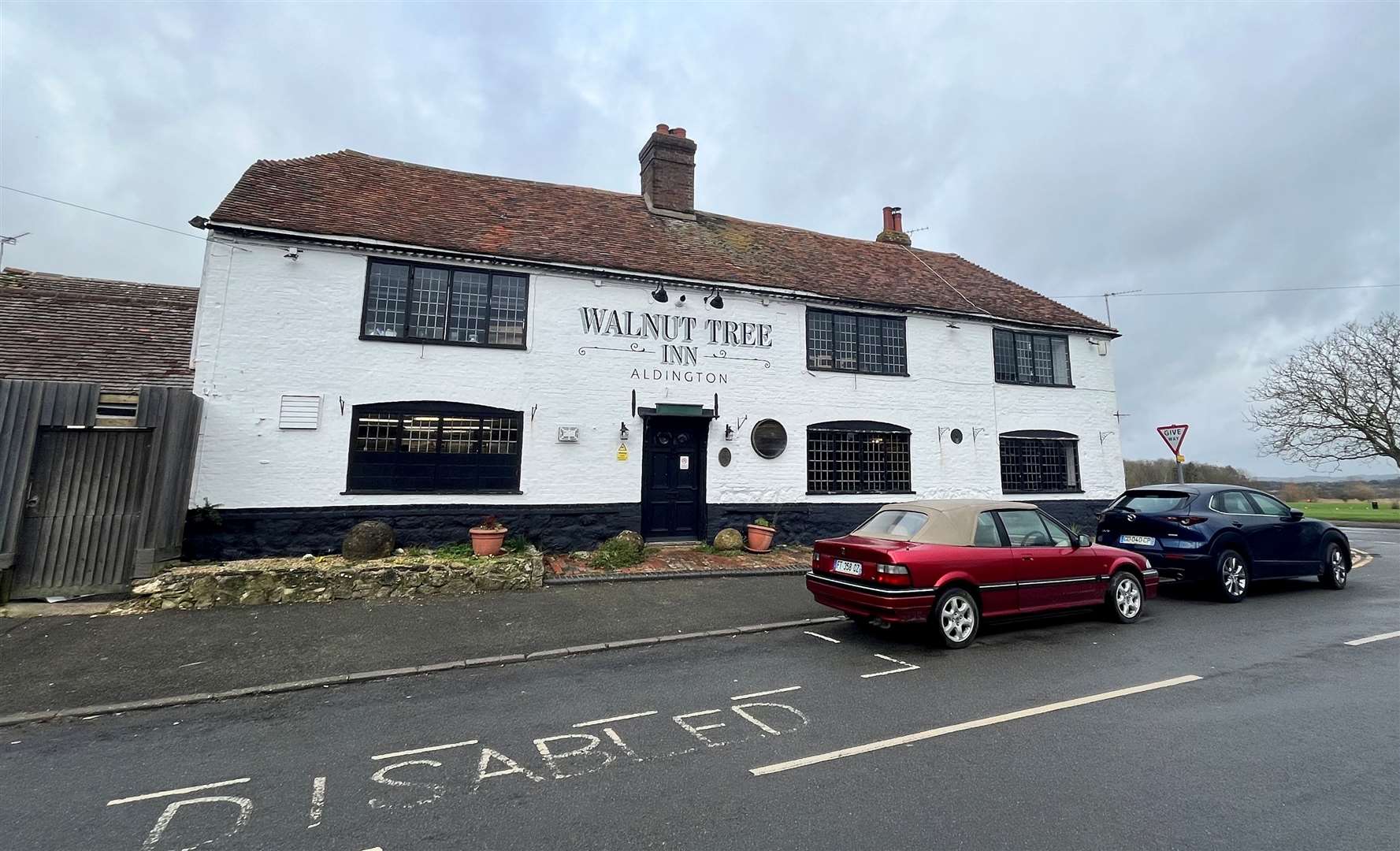 The 14th century Walnut Tree Inn sits in Forge Hill