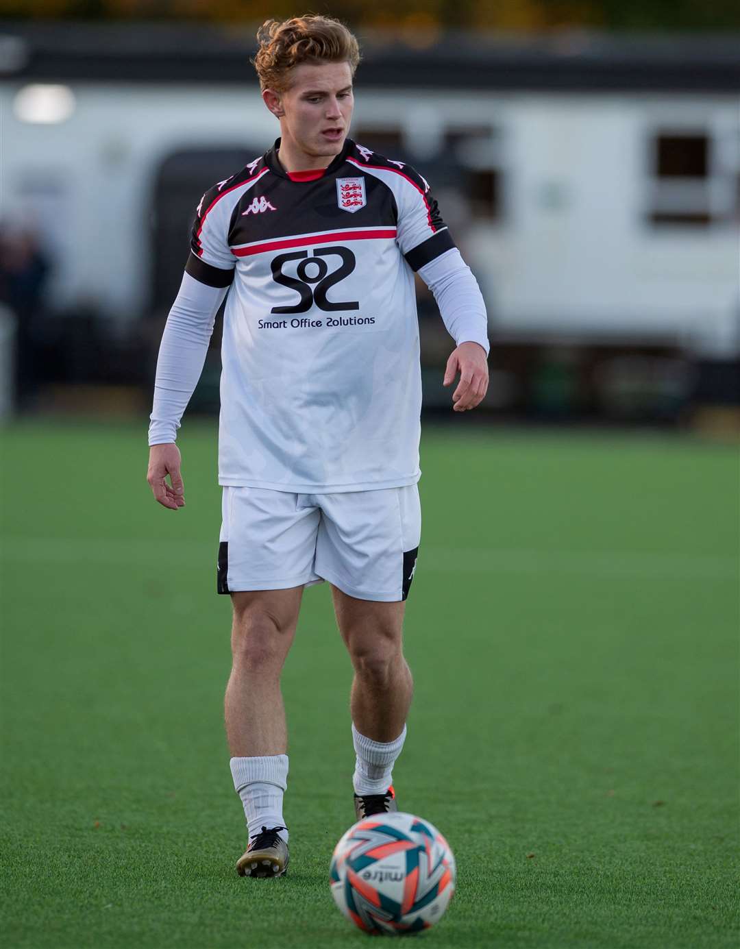 Returning Faversham playmaker Nathan Wood stands over the ball. Picture: Ian Scammell