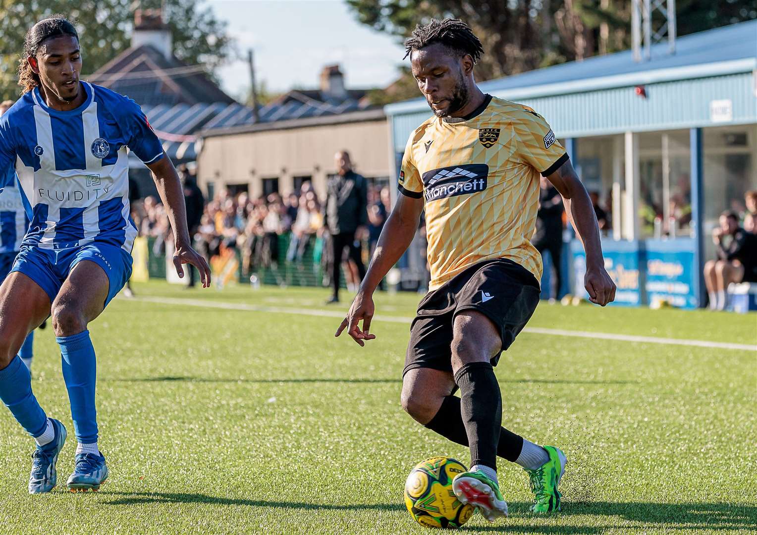 Young Herne Bay defender Skye Salmon keeps tabs on a Maidstone player. Picture: Helen Cooper