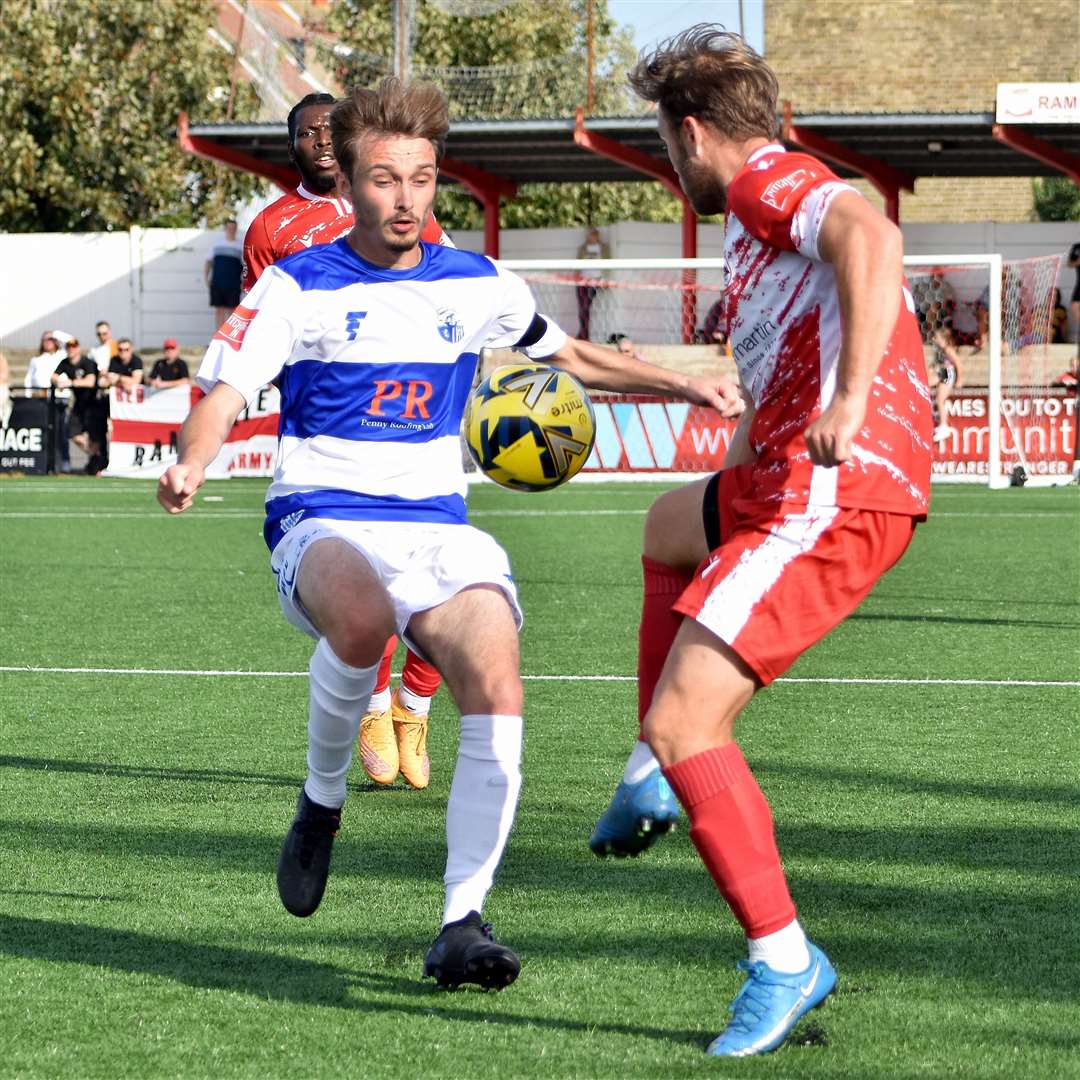 Sheppey's Jacob Lambert, left, takes on Ramsgate's Jack Parter. Picture: Randolph File