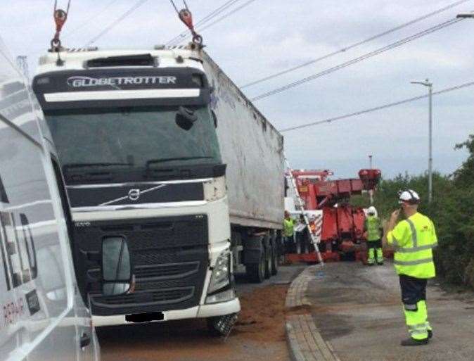 The overturned vehicle caused traffic problems in Swale Way, Sittingbourne, this morning. Picture: KCC Highways