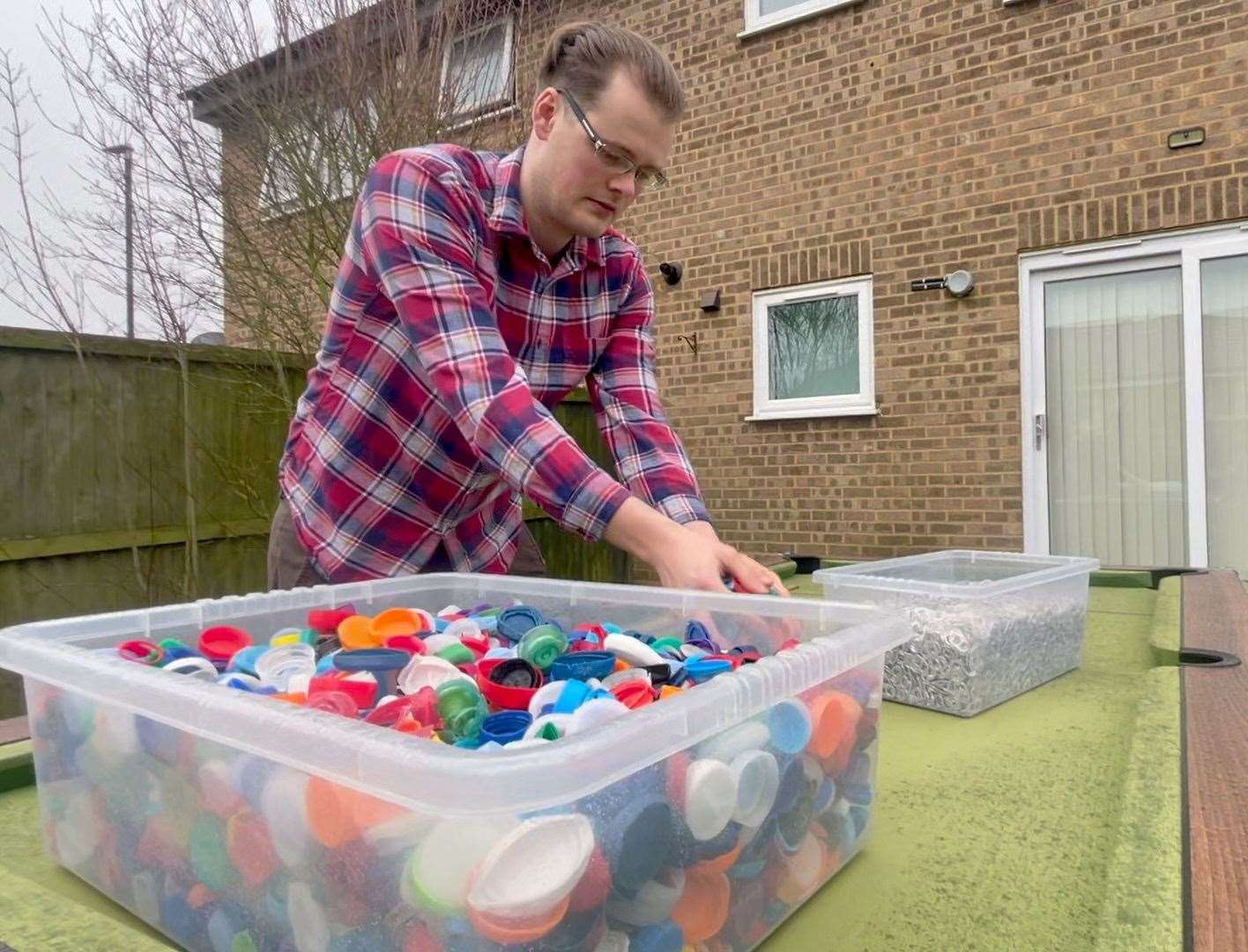 Kieran sorts lids on his snooker table