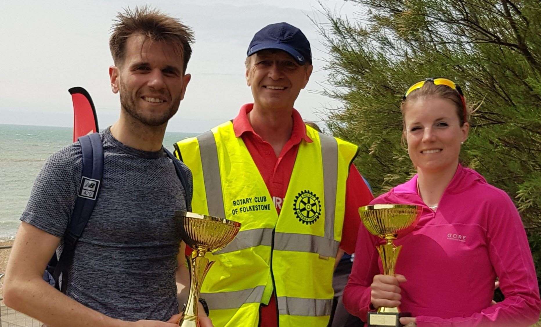 Race director Ray Johnson, centre, with the winners of the Folkestone Coastal 10k last year