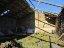 The derelict barn is in Bull Lane, Newington, near Sittingbourne