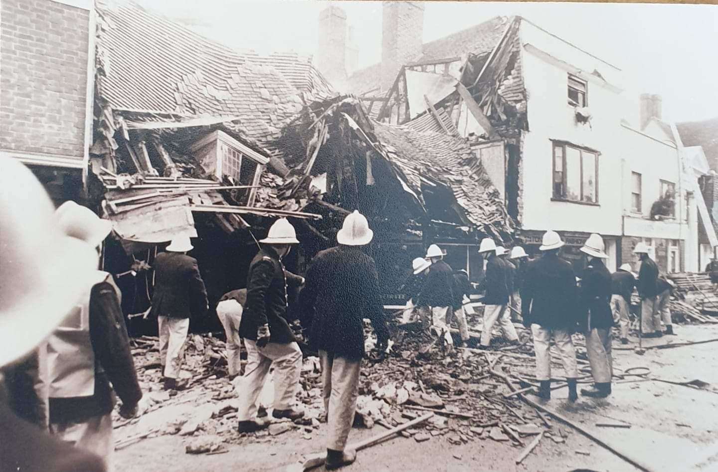 Several firefighters were seconds away from being crushed by the collapsing building