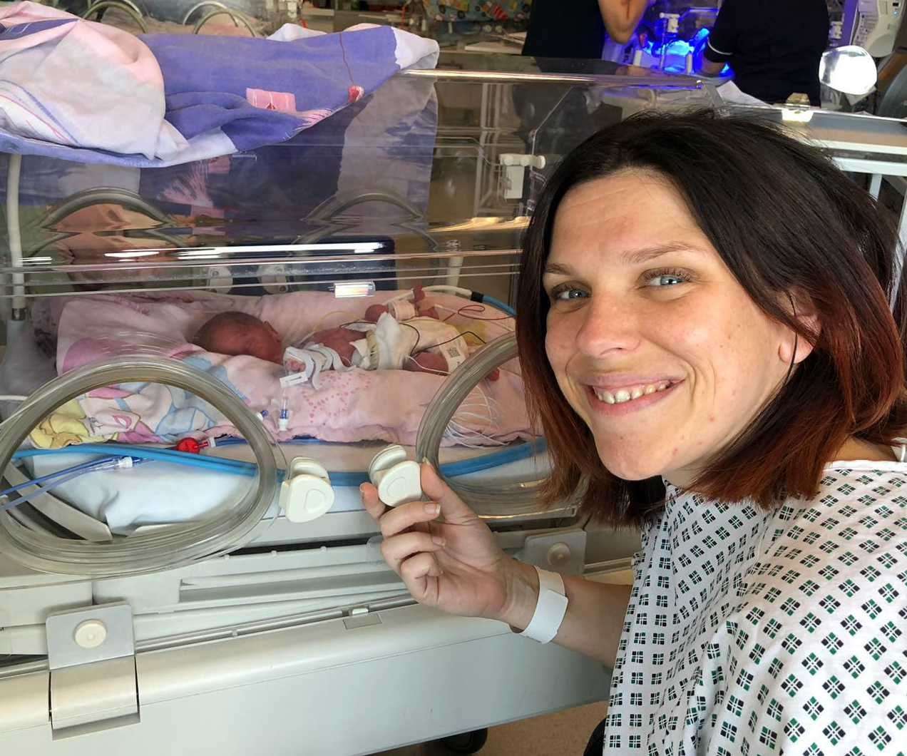 Mum Hannah Grout with tiny Maggie at the special care baby unit