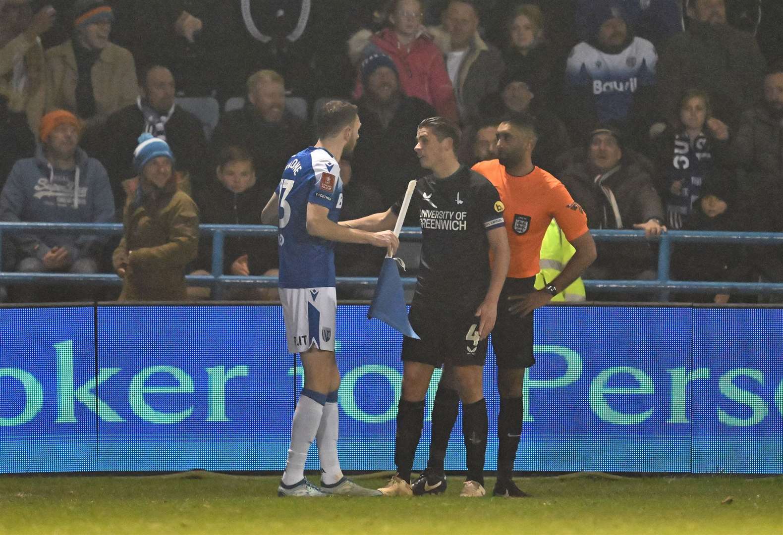 A broken corner flag led to a brief pause in play Picture : Keith Gillard