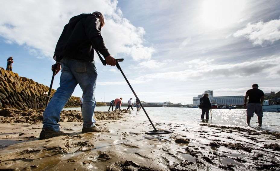 He found the ring using a metal detector. Stock Image.