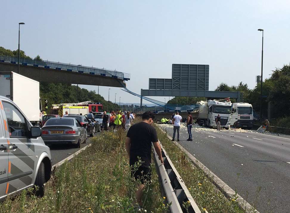 The M20 closed after a pedestrian bridge collapsed onto the carriageway. Picture: Natasha Najm