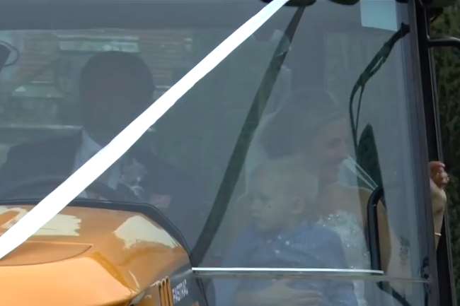 Tim, Amy and their son Harry ready to head to the reception