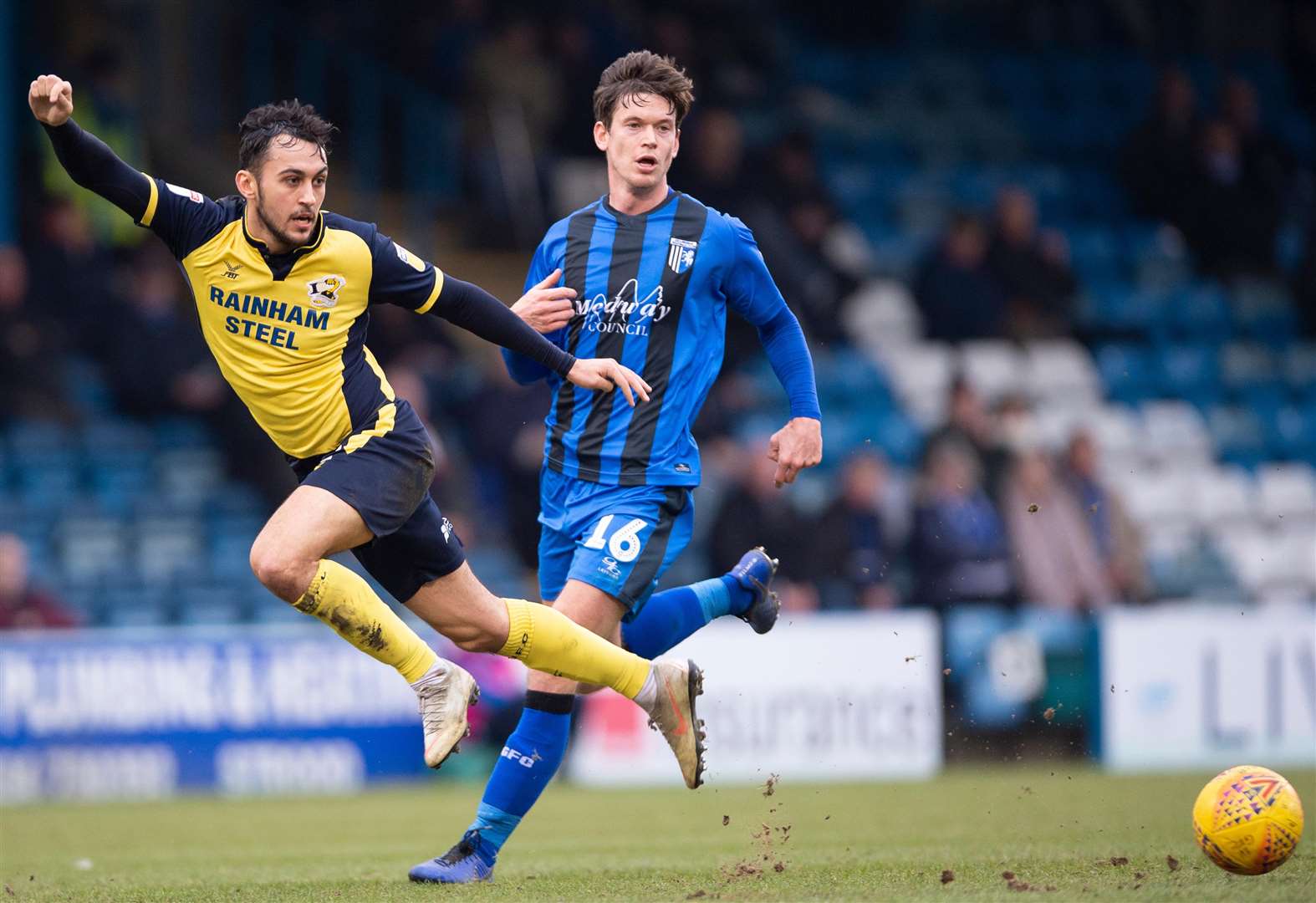 Scunthorpe's Levi Sutton battles with Billy Bingham Picture: Ady Kerry