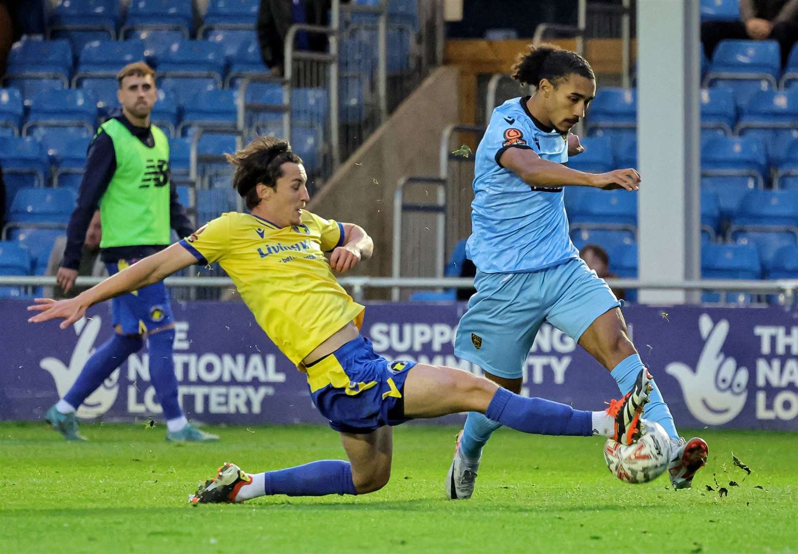 Maidstone top scorer Aaron Blair is stopped in his tracks as he runs in on goal. Picture: Helen Cooper