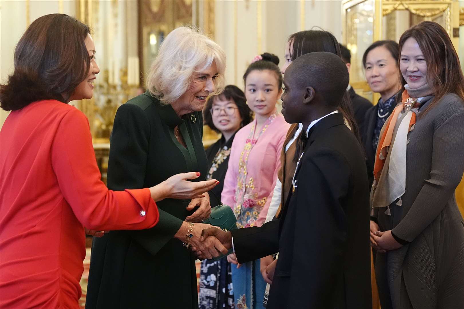 Camilla meeting the winners and runners-up during the reception at Buckingham Palace (Aaron Chown/PA)