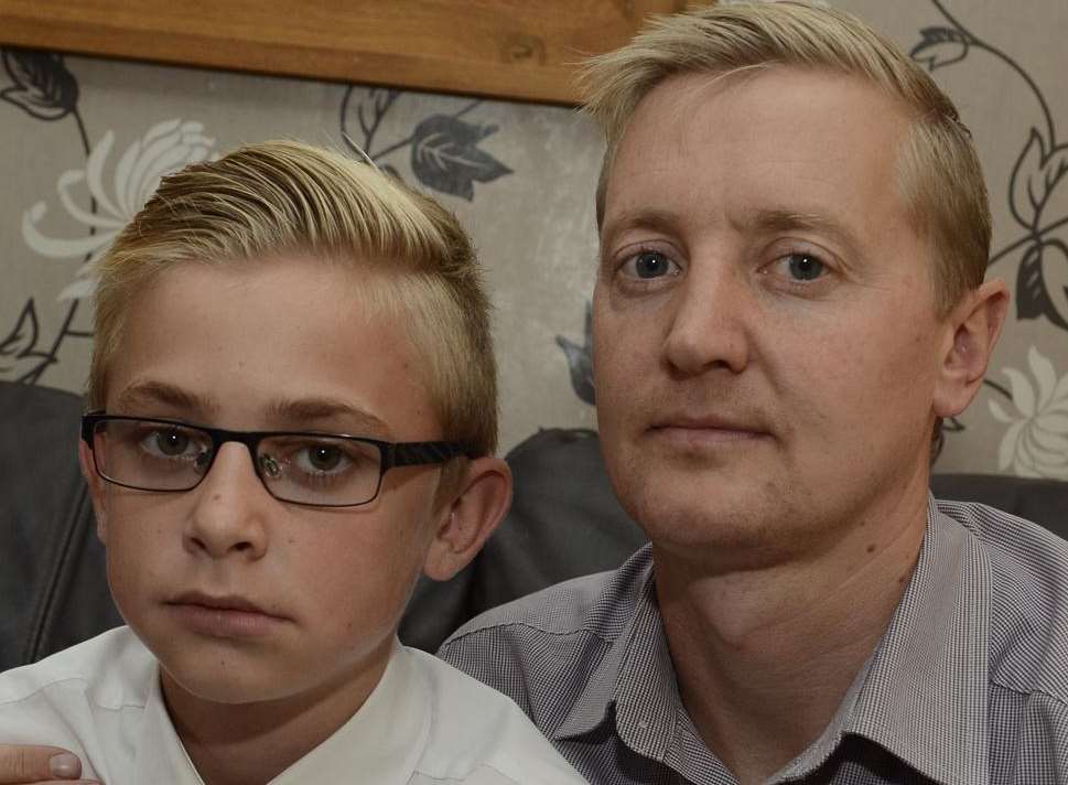 Mugging victim Bradley Rickard and his father Jamie.