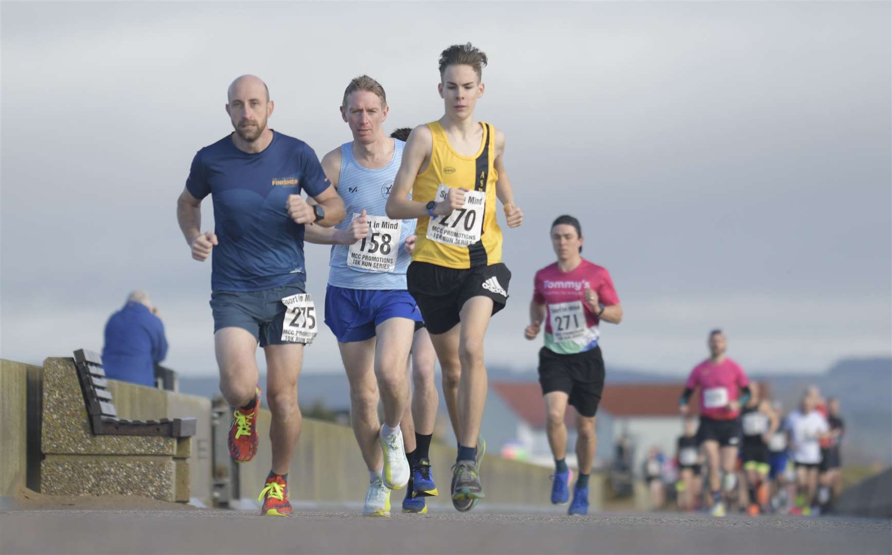 Ashford AC's Edward Brown (No.270) among the runners on the Sea Wall at Dymchurch, heading towards New Romney.Picture: Barry Goodwin