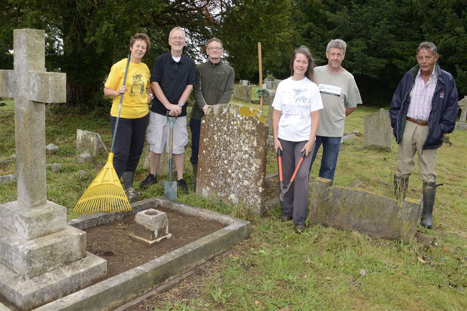 Members of the local history society uncovered a mysterious headstone with Greek writing on. Pictured: Sharon Butler, Richard Hull, Nick Wheat Sheila Flynn, Chris Rogers and Martin Crompton by the Graves they have uncovered Picture: Paul Amos