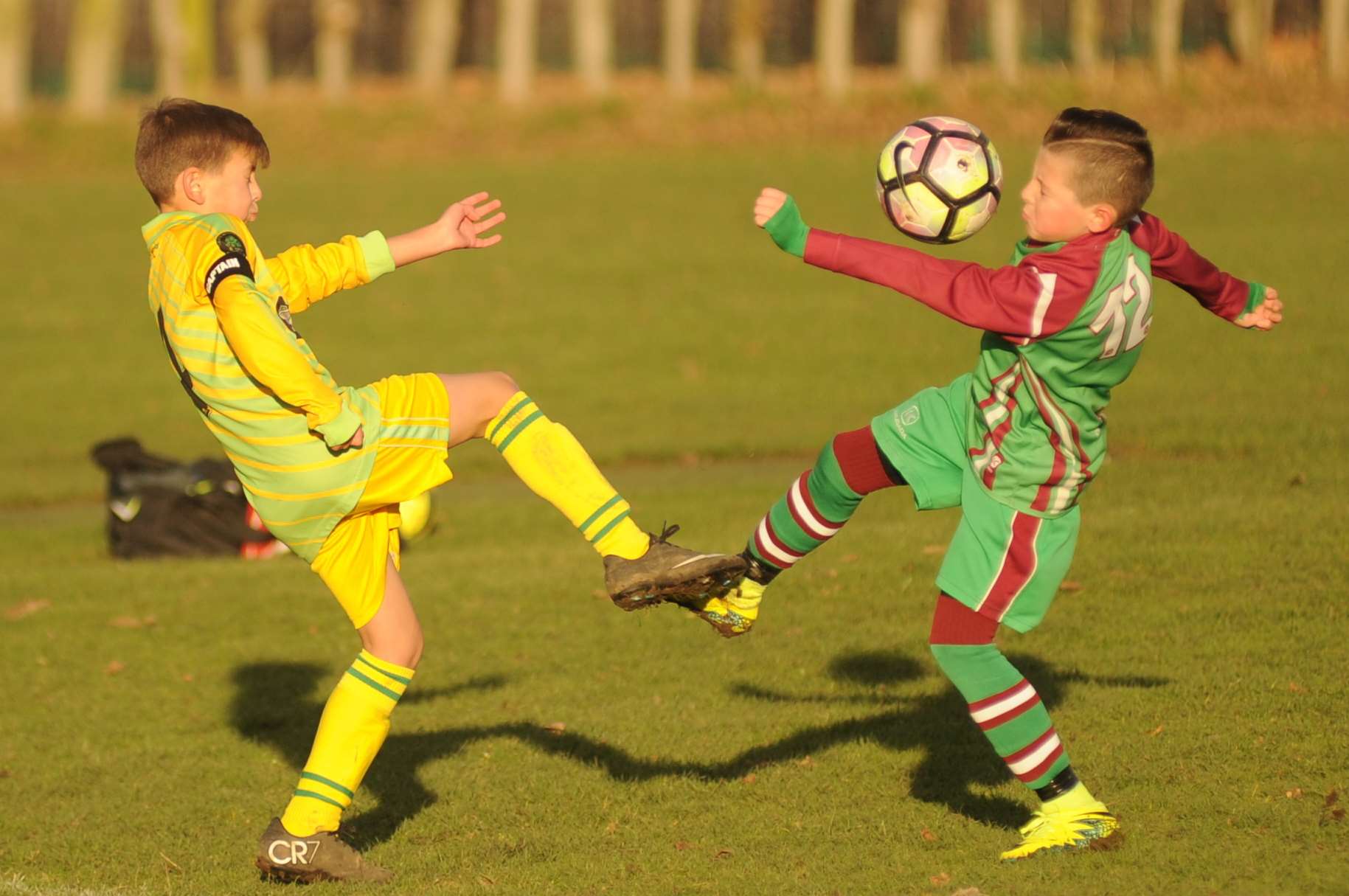 Cliffe Woods Colts under-11s, left, and Cobham Colts on the stretch Picture: Steve Crispe