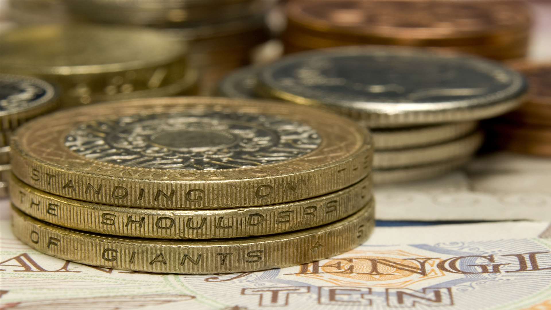 A selection of British currency coins and notes. Stock Image.