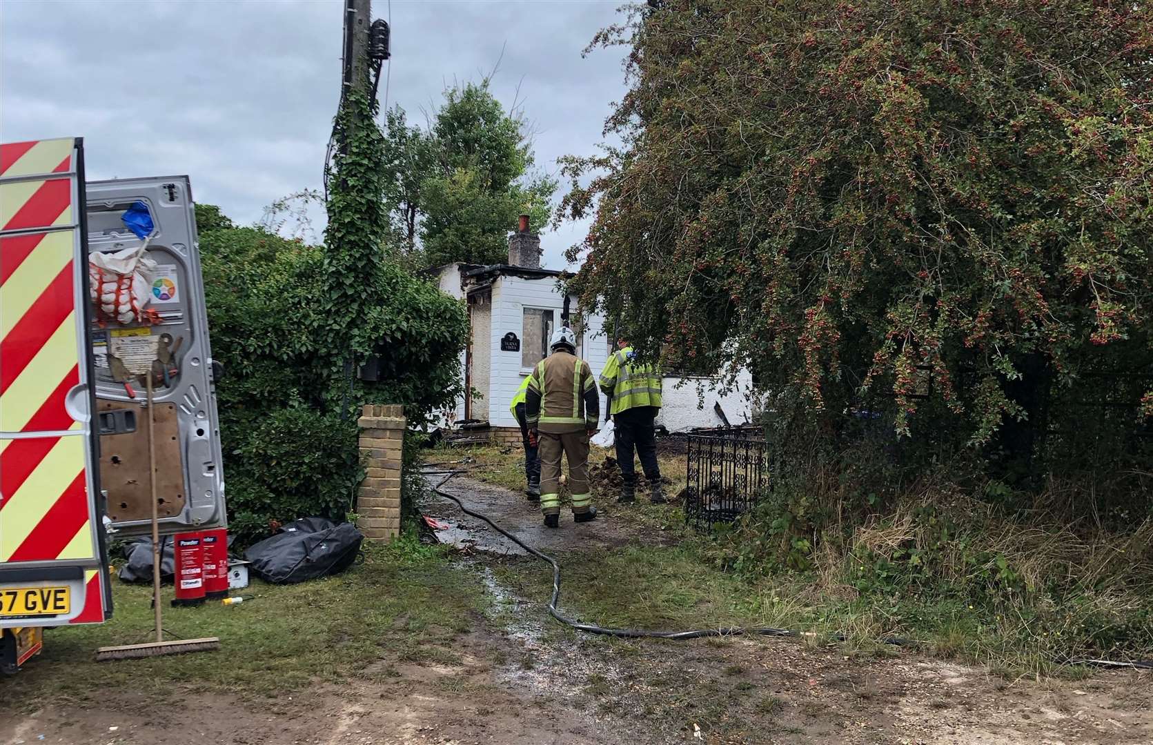 Fire crews at the scene of the bungalow fire in Warden this morning. Picture: Stephen Mina-Jones