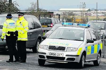 Police at scene of bomb scare at Asda, Chatham