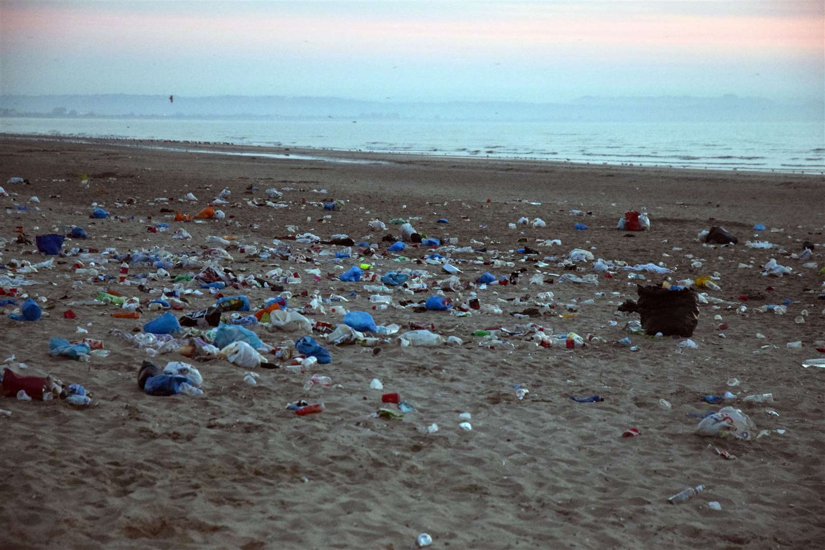 Rubbish left on Greatstone beach after the illegal party. Picture: Pd Photography