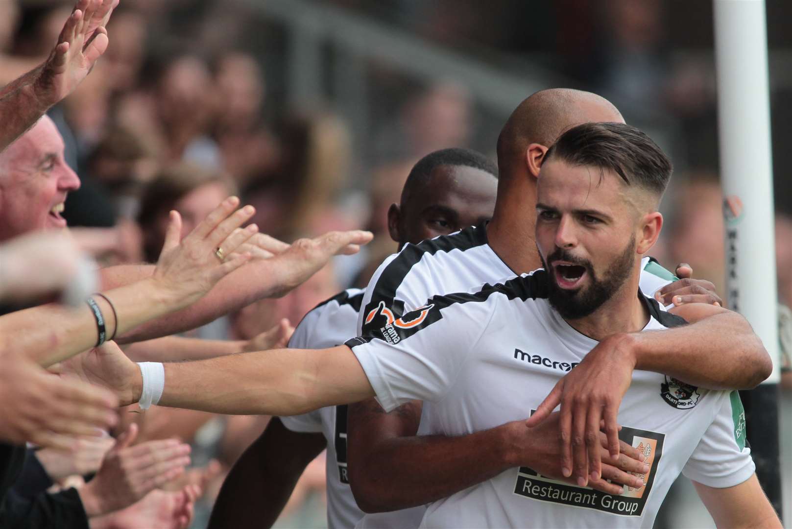 Ben Greenhalgh celebrates scoring Dartford's second goal against East Thurrock. Picture: John Westhrop