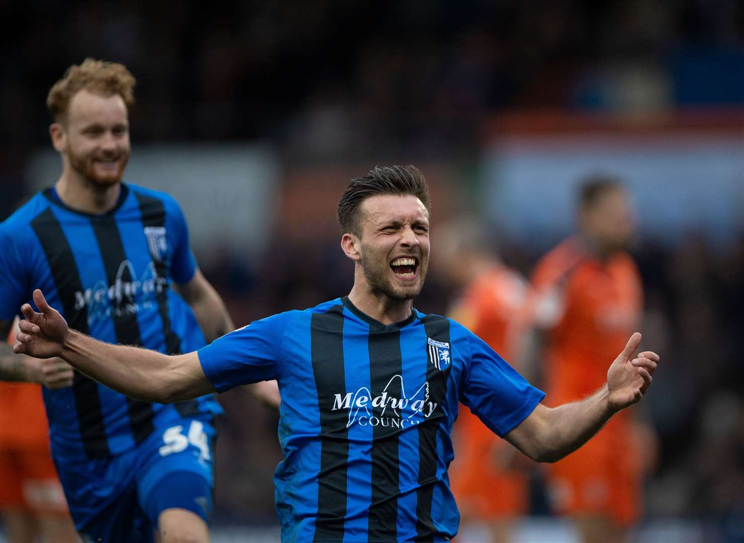 Luke O'Neill celebrates the second equaliser against Luton Picture: Ady Kerry