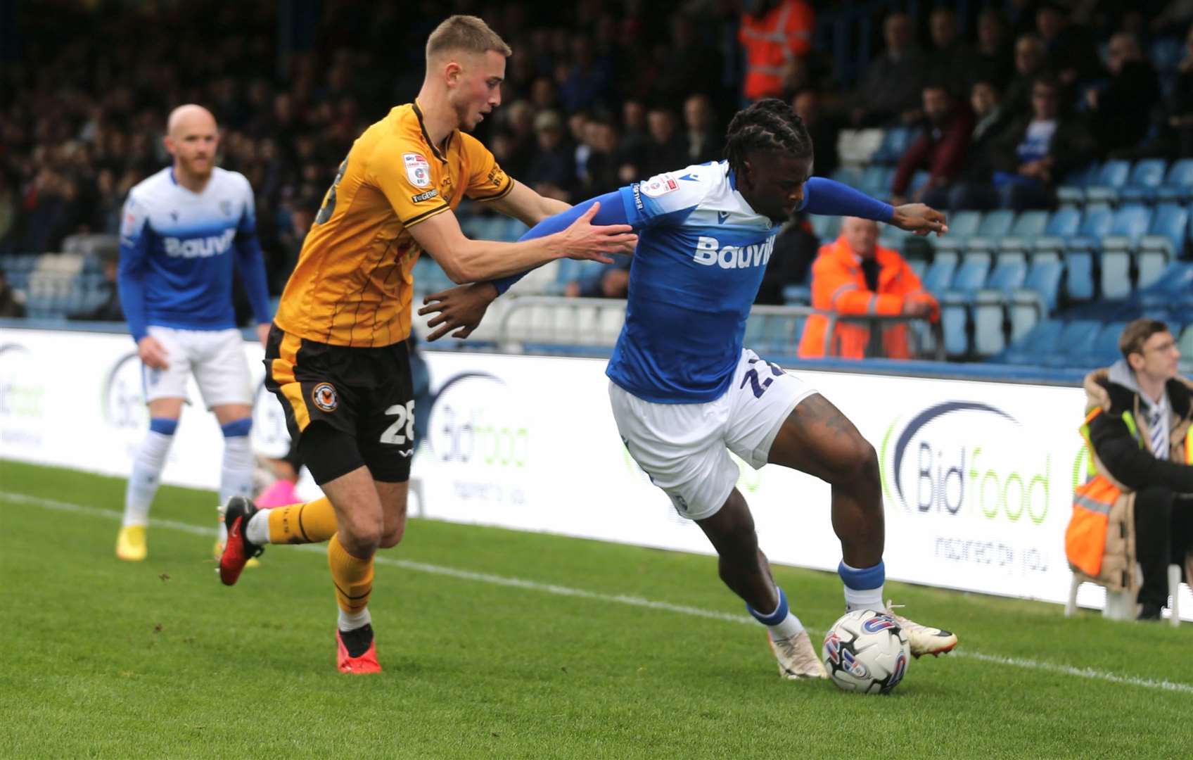 Shad Ogie holds off former Gills youth player Matt Baker Picture: Beau Goodwin