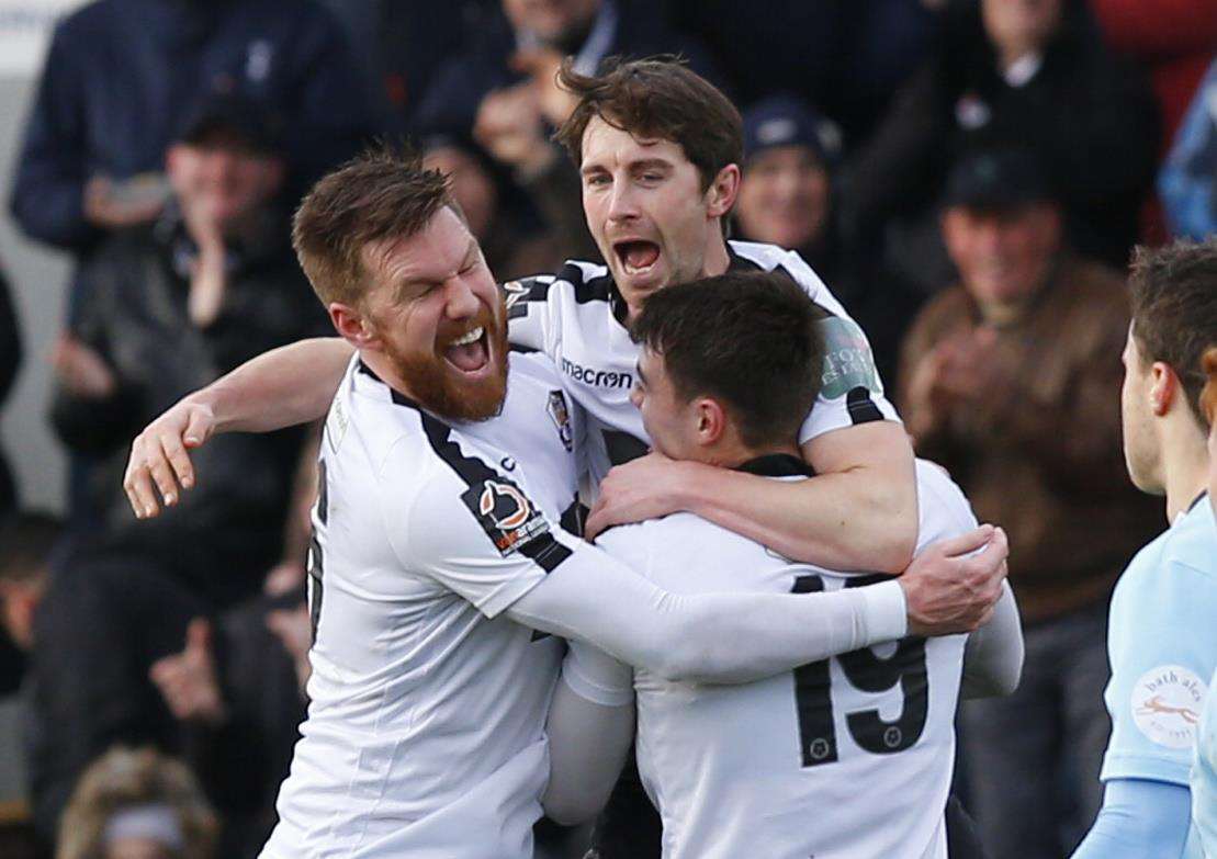 Lee Noble celebrates his spectacular strike against Bath City Picture: Andy Jones