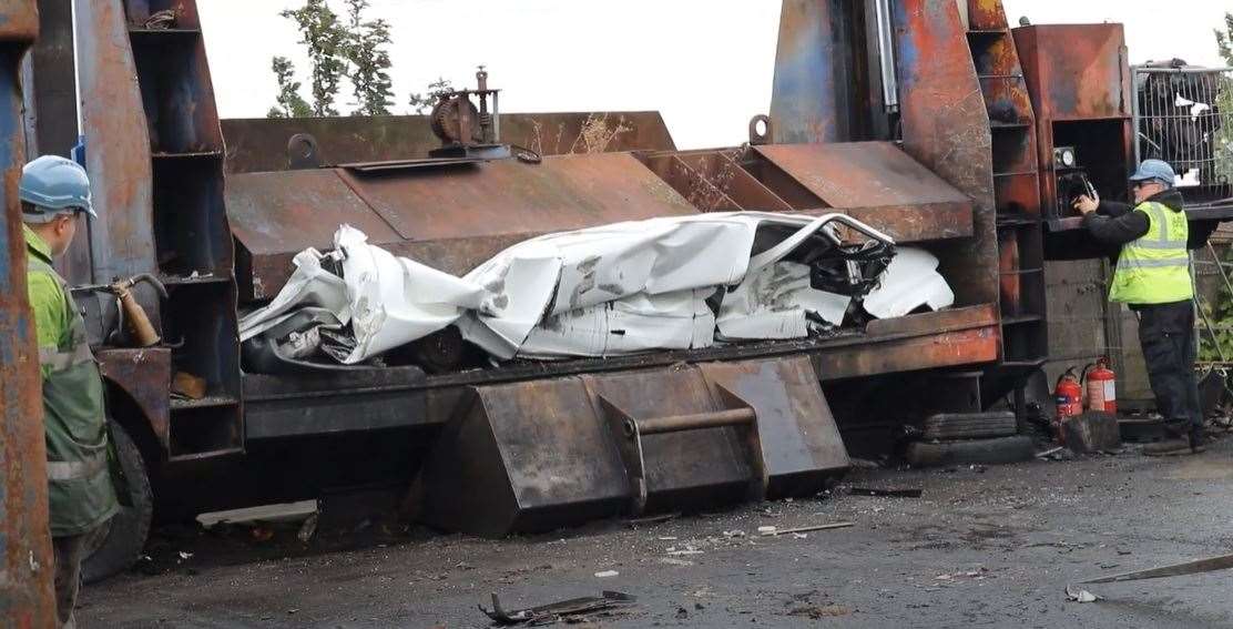 Going - a van impounded from Sheerness is crushed at Bobbing Car Breakers as part of Swale council's fight against fly-tipping. Picture: Swale Council