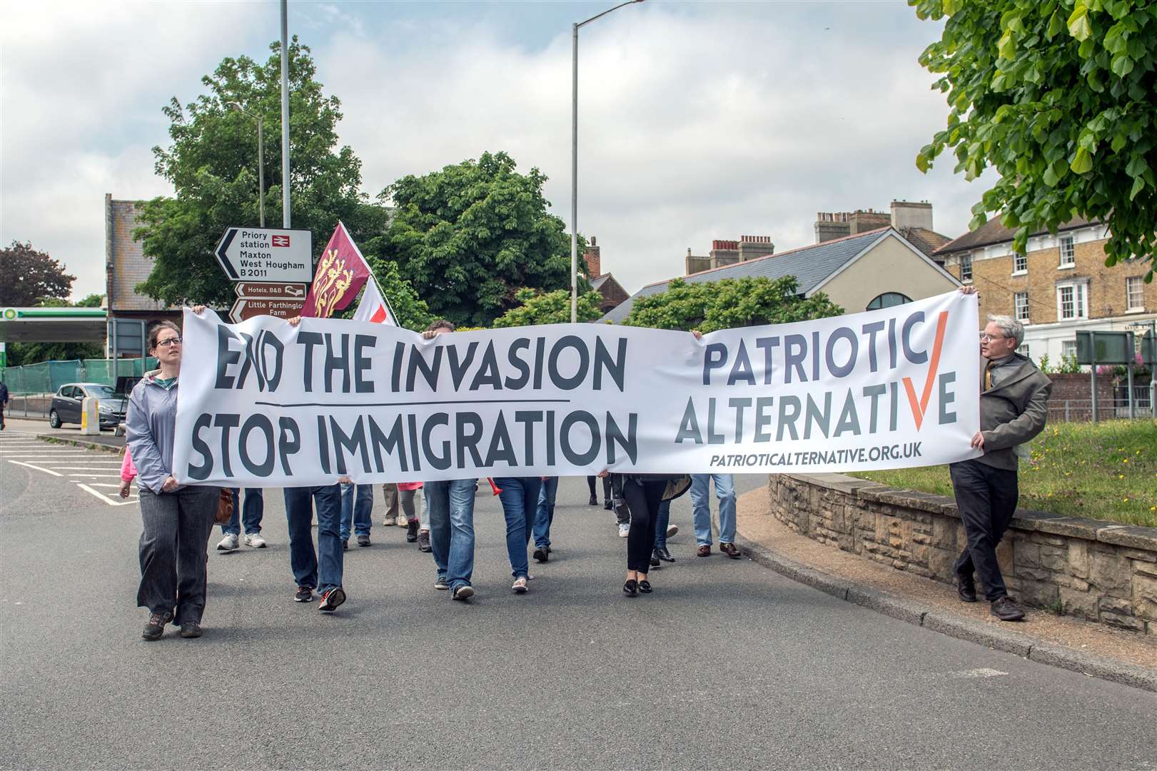 A banner carried their message. Picture: Stuart Brockman