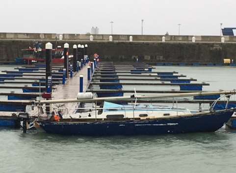 Two people called for help after the yacht they were on ran aground on the Margate Sands.