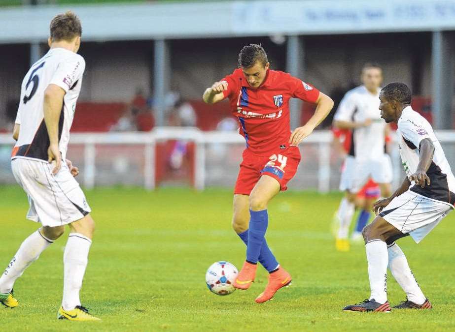 Brennan Dickenson on the ball for Gills at Dover Picture: Tony Flashman