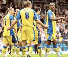 Gills players ask what went wrong after conceding a goal during the 4-1 defeat at Leeds