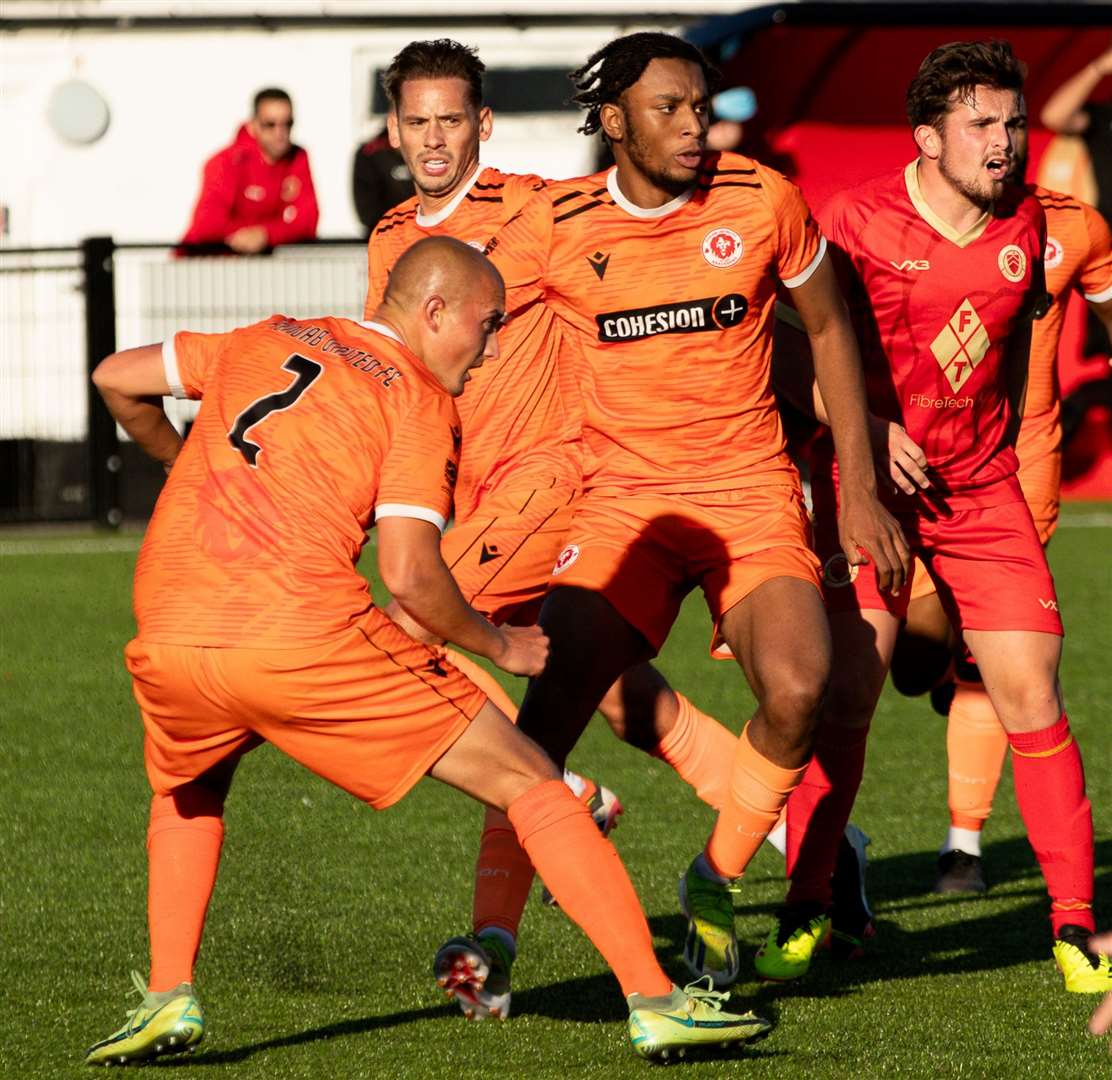 Whitstable midfielder Liam Gillies is surrounded. Picture: Les Biggs